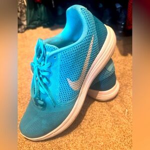 Turquoise/Aqua Nike women’s sneakers….Size 9  Lightweight, comfy, gently worn